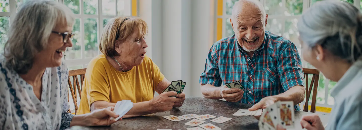 People playing cards at a table.