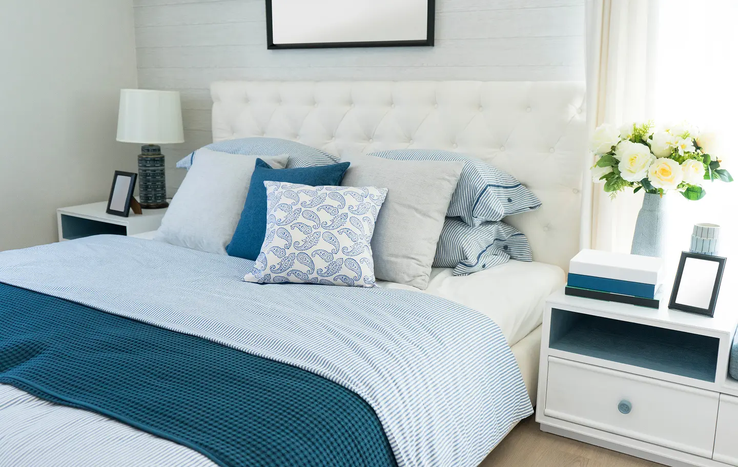 Cozy bedroom with blue accents.